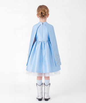 Ice blue girls cape dress with flowing cape panels and concealed back zipper back view