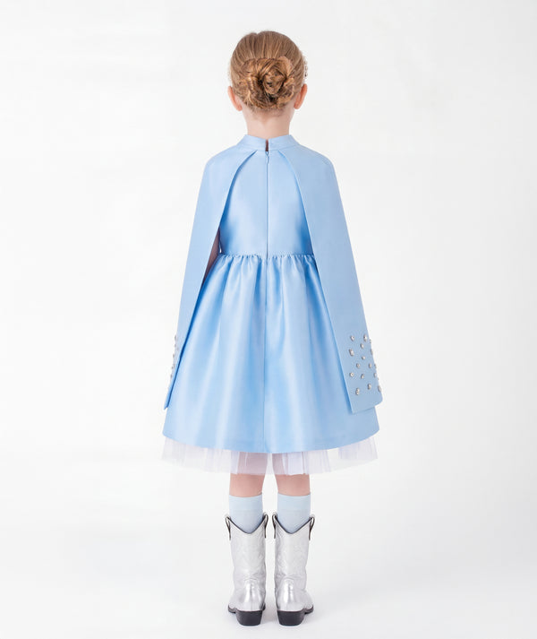 Ice blue girls cape dress with flowing cape panels and concealed back zipper back view