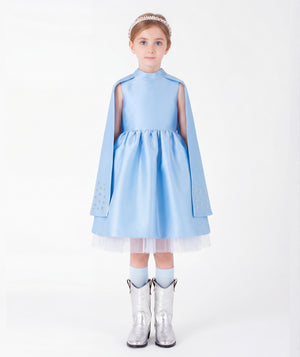 Ice blue satin girls cape dress with crystal embellished cuffs and tulle hem front view