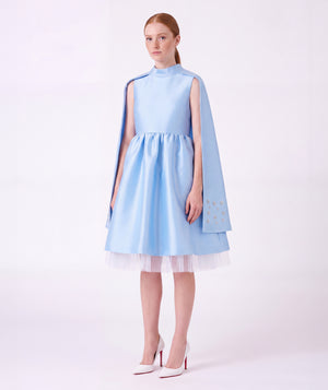 Diamond-Embellished Women's Cape Dress in powder blue with crystal-detailed cape panels and tulle hem by Mama Luma