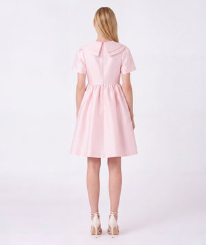 Back view of Enchanting Brooch Women's Dress in pink cotton, highlighting neckline, sleeves and embellishments