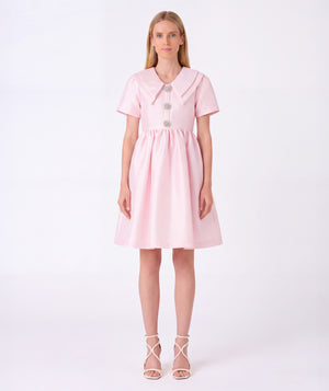 Front view of Enchanting Brooch Women's Dress in pink cotton, showing overall silhouette and styling