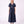Load image into Gallery viewer, Front view of the Enchanting Brooch Women’s Dress from Mama Luma’s Suva Maia Collection, featuring three crystal floral brooches and a layered collar.
