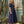 Load image into Gallery viewer, Enchanting Brooch Women’s navy maxi dress with crystal floral brooches and a sculptural layered collar from Mama Luma’s Suva Maia Collection.
