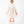 Load image into Gallery viewer, Back view of Enchanting Feathers Girls Dress in beige with a voluminous feather-textured skirt for girls ages 3 to 12 by Mama Luma.
