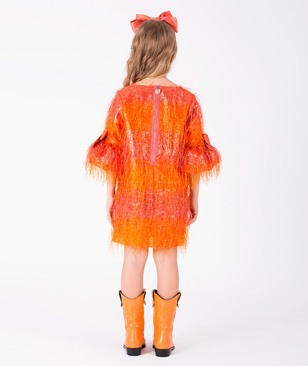 Back view of Enchanting Feathers Girls Dress in coral feather for girls ages 3 to 12, showing the silhouette and refined construction