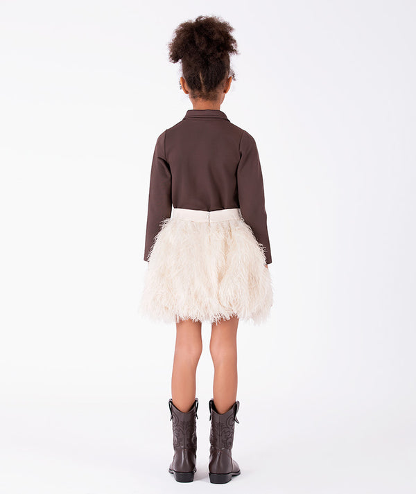 Back view of Enchanting Feathers Girls Outfit with chocolate long-sleeve top and ivory feather-textured skirt for girls ages 3 to 12 by Mama Luma.