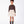 Load image into Gallery viewer, Front view of Enchanting Feathers Girls Outfit with chocolate polo-inspired top and voluminous ivory feather skirt for girls ages 3 to 12 by Mama Luma.
