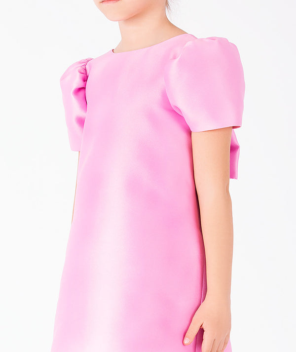 Enchanting pink girls dress with sculpted puff sleeves from the Hanae Collection