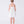 Load image into Gallery viewer, Back view of ivory girls dress featuring structured bodice, concealed zipper and softly gathered skirt.
