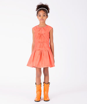 Front view of Exquisite Bows Girls Dress in coral for girls ages 3 to 12, a premium children’s design by Mama Luma