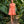 Carica l'immagine nel visualizzatore Galleria, Exquisite Bows Women's Dress in coral styled in a tropical garden, featuring tonal bows and a structured pleated skirt.
