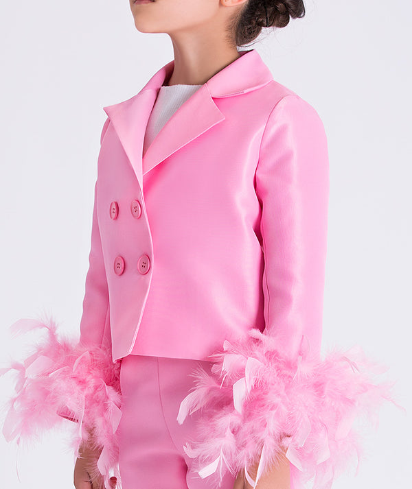 Detail view of Feather Sleeve Girls Jacket highlighting soft feather sleeve cuffs and double breasted design by Mama Luma