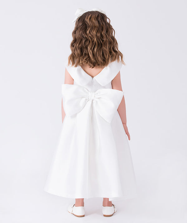 Back view of Flared Collar Girls Dress featuring statement bow and elegant fit from Mama Luma’s Kohana Collection