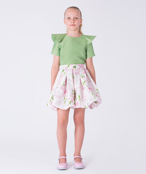 Front view of a flared floral girls outfit with structured green top and floral skirt, designed for elegant daytime occasions.
