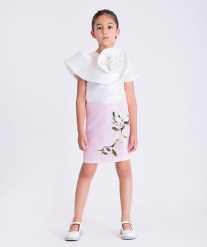 Floral appliqué girls outfit featuring a sculptural top with 3D flower detail and matching skirt, two-piece set by Mama Luma