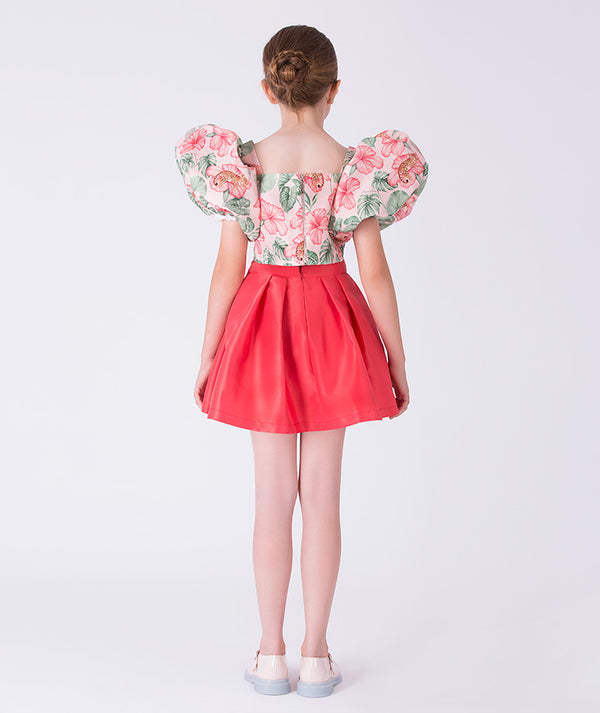 Back view of the Floral Balloon Sleeve Girls Outfit showing the balloon-sleeve top with back zip closure and softly flared short skirt made from breathable lightweight fabric, designed for girls ages 3–12 for Eid, Easter, and garden parties.