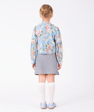 Back view of powder blue floral girls blouse with long gathered sleeves and romantic rose pattern by Mama Luma