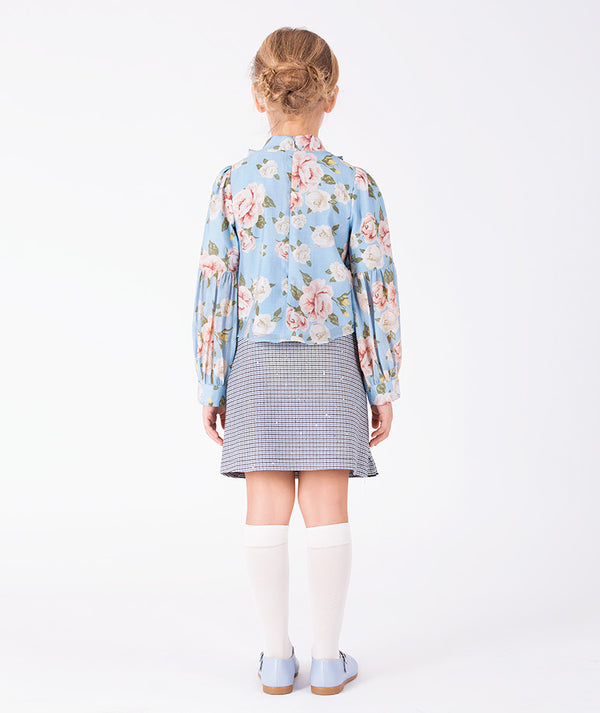 Back view of powder blue floral girls blouse with long gathered sleeves and romantic rose pattern by Mama Luma