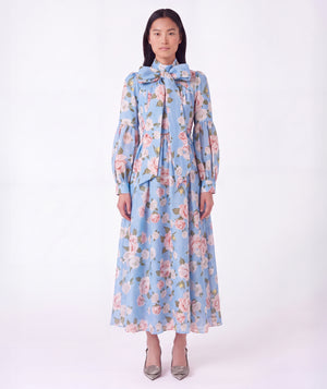 Floral Bow Women's Dress in blue with pink rose print, statement neckline bow and flowing skirt from Mama Luma