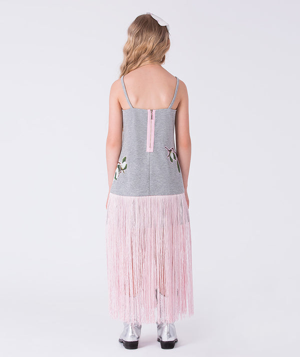 Back view of floral fringe girls dress by Mama Luma, sleeveless occasion dress with fringe skirt and back zipper detail