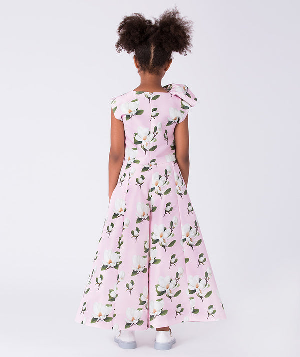 back of girls pink two-piece floral outfit with ruffle detail top and flowing wide-leg pants by Mama Luma