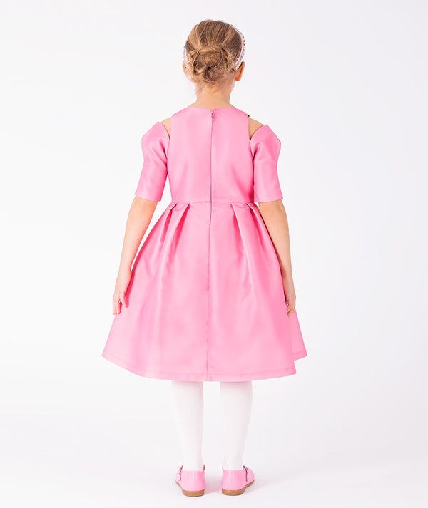 Close-up of Floral Shoulder Detail Girls Dress in vibrant pink structured matte satin for girls ages 3 to 12, highlighting neckline, sleeves and embellishments