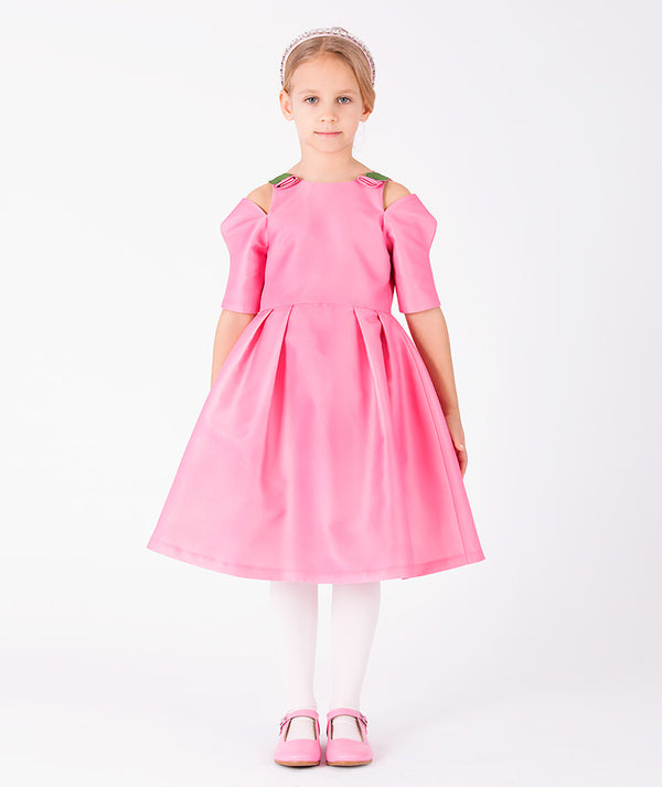 Close-up of Floral Shoulder Detail Girls Dress in vibrant pink structured matte satin for girls ages 3 to 12, highlighting overall silhouette and styling