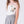 Load image into Gallery viewer, Close-up of floral appliqué strapless top on girls two-piece outfit by Mama Luma, elegant occasion wear detail
