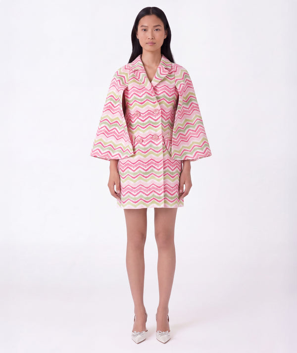 Front view of pink and green chevron girls cape outfit