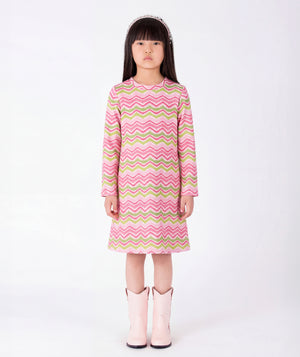 Front view of pink chevron girls dress with silver boots