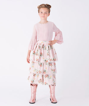 Girl wearing Mama Luma Lace Trim Flowers Outfit — pink lace blouse with floral skirt, luxury girls occasionwear for Eid, weddings and birthdays