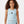 Load image into Gallery viewer, Front-facing close-up of a girl wearing a light blue sleeveless ribbed tank top, styled for breathable summer comfort, everyday movement, and soft athleisure wear, available in sizes 3–14
