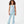 Load image into Gallery viewer, Front-facing lifestyle image of a girl wearing a light blue sleeveless ribbed tank with coordinating flared pants, styled for breathable summer outfits, relaxed movement, and everyday comfort, available in sizes 3–14
