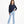 Load image into Gallery viewer, Girl wearing a navy sweatshirt and light blue ribbed pants, styled for everyday athleisure, school days, and active play, available in sizes 3–14
