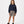 Load image into Gallery viewer, Girl wearing a navy sweatshirt and taupe shorts, styled for everyday athleisure, school days, and active play, available in sizes 3–14
