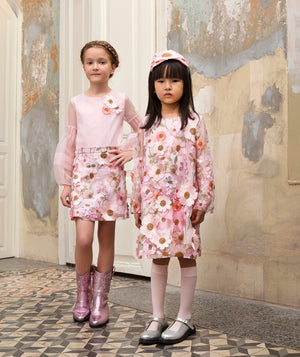 Girls wearing Mama Luma silver Mary Jane shoes with occasion dresses — luxury patent leather footwear for birthdays, Easter and family gatherings