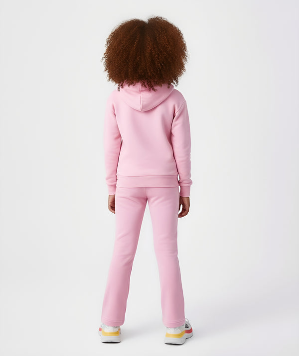 Girl seen from the back wearing a pink hoodie and matching jogger pants, styled for everyday athleisure, school days, and active play, available in sizes 3–14