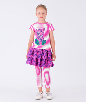 Girls pink striped short sleeve top with playful leopard graphic paired with a tiered purple leopard print skirt and matching striped leggings, styled for school days, playdates, birthday celebrations, and everyday fun, available in sizes 3–12