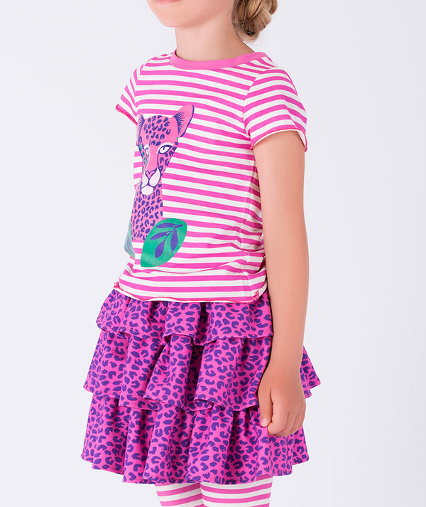 Girls pink striped short sleeve top with playful leopard graphic paired with a layered purple leopard print skirt, designed for school days, playdates, birthday parties, and fun weekend outings, available in sizes 3–12