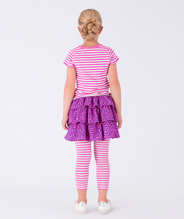 Back view of girls pink striped short sleeve top styled with a tiered purple leopard print skirt and matching striped leggings, designed for school days, playdates, birthday fun, and weekend wear, available in sizes 3–12