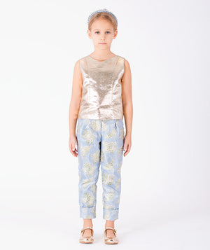 Gold Flowers girls outfit with metallic sleeveless top and powder blue floral jacquard trousers front view
