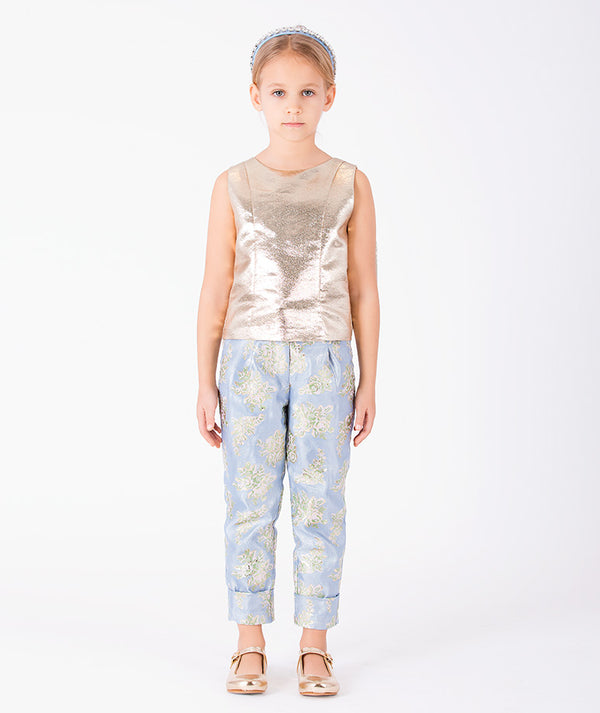 Gold Flowers girls outfit with metallic sleeveless top and powder blue floral jacquard trousers front view