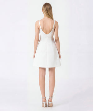 blonde women wearing white dress back shot