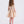 Carica l'immagine nel visualizzatore Galleria, Back view of metallic gold baby girls dress featuring short sleeves, flared silhouette and concealed zipper detail
