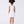 Carica l'immagine nel visualizzatore Galleria, Back view of sleeveless ivory girls dress with concealed zipper and structured flared skirt design.
