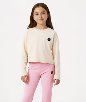 GoldenCubs beige cropped sweatshirt paired with pink flare pants, designed for girls who love comfort and modern sporty style. Perfect for school, lounging, and weekend adventures. Available in sizes 3–12Y.
