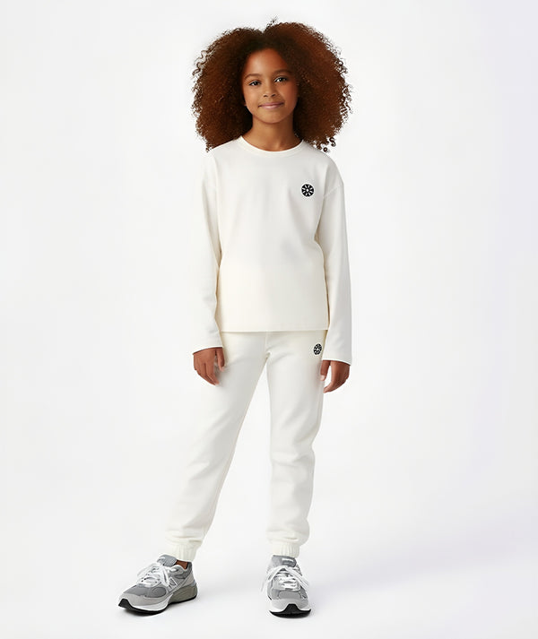 Goldencubs Girls’ White Cotton Sweatshirt and Sweatpants Set featuring a soft fleece interior, minimalist logo detail, and a modern relaxed fit — ideal for school, playdates, or weekend outings. Available in sizes 3–12Y.