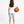 Charger l'image dans la galerie, GoldenCubs girl wearing a white T-shirt and light blue shorts, holding a basketball, styled in a sporty and minimal athleisure outfit perfect for playtime or casual days. Available in sizes 3–12Y.
