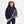 Carica l'immagine nel visualizzatore Galleria, Studio portrait of a girl wearing a navy athletic hoodie and matching leggings from GoldenCubs. She holds a tennis racket and wears a white GoldenCubs cap, representing the brand’s stylish kids’ activewear line inspired by Lululemon.
